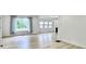 Open concept living room with bright natural light and wood-look flooring at 1920 E Epler E Ave, Indianapolis, IN 46227