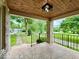 Charming porch features stone pillars and a unique, patterned stone floor at 1920 E Epler E Ave, Indianapolis, IN 46227