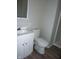 This bathroom has a white toilet, new shower, and vanity at 2007 Park Ave, Anderson, IN 46016