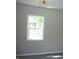 This bedroom offers a bright window and neutral walls, creating a calming and inviting space at 2007 Park Ave, Anderson, IN 46016