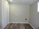 This laundry room includes hookups and vinyl plank flooring at 2007 Park Ave, Anderson, IN 46016