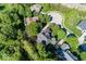 Home situated within a lush community with tree-lined streets and well-maintained properties seen from above at 21218 Carlton Ct, Noblesville, IN 46062