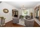 Inviting living room with ample seating, hardwood floors and natural light at 21218 Carlton Ct, Noblesville, IN 46062