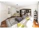 Bright living room with hardwood floors, fireplace, built-in shelves and an open layout at 21218 Carlton Ct, Noblesville, IN 46062