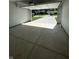 Spacious two-car garage with a view of the driveway and street at 223 N Coventry Dr, Anderson, IN 46012