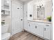 Bathroom includes modern toilet, vanity with storage, and a wall mirror at 3027 Griffa Ave, Columbus, IN 47203