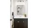 Bathroom featuring updated vanity, mirror and lighting at 3027 Griffa Ave, Columbus, IN 47203