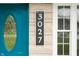 A close up of the 3027 house number by the intricate blue door at 3027 Griffa Ave, Columbus, IN 47203
