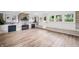 Bright living room with stone fireplace, built-in storage, and natural light at 3027 Griffa Ave, Columbus, IN 47203