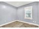 Bright bedroom with a window and neutral carpet at 3109 E St Joseph St, Indianapolis, IN 46201