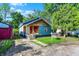 Charming single-story home with blue siding and wood shingle accents; great curb appeal at 3109 E St Joseph St, Indianapolis, IN 46201