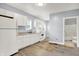 Bright kitchen features white cabinetry, modern appliances, and ample counter space at 3109 E St Joseph St, Indianapolis, IN 46201