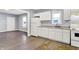 Bright kitchen features white cabinetry, modern appliances, and ample counter space at 3109 E St Joseph St, Indianapolis, IN 46201