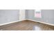 Bright living room features new floors, fresh paint, and ample natural light at 3109 E St Joseph St, Indianapolis, IN 46201