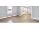 Bright living room features new floors, fresh paint, and ample natural light at 3109 E St Joseph St, Indianapolis, IN 46201