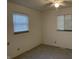 Bedroom with two windows and carpeted floors at 3208 Wellington Ave, Indianapolis, IN 46226