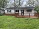 Charming home featuring a inviting front porch, and tidy landscaping, with a secure Vivint system installed at 3208 Wellington Ave, Indianapolis, IN 46226