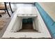 Stairs leading down into a basement are seen in the floor of this home at 3552 N Talley Rd, Columbus, IN 47203