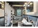 Cozy bathroom with modern vanity, rain shower head, and stylish decor at 3552 N Talley Rd, Columbus, IN 47203