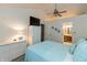 Inviting bedroom with wicker furniture, soft lighting, and calm decor at 3754 Smallwood W Ln, Indianapolis, IN 46214