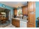 Well-lit kitchen with updated appliances, lots of storage space, and adjacent dining area at 3754 Smallwood W Ln, Indianapolis, IN 46214