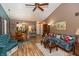 Open-concept floor plan connects the living room to the dining area, creating a welcoming space at 3754 Smallwood W Ln, Indianapolis, IN 46214