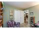 Relaxing home office featuring a plush chair and built-in bookcase at 3754 Smallwood W Ln, Indianapolis, IN 46214