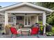 Back patio with outdoor furniture, fire pit, and covered seating area at 3904 Haverhill Dr, Indianapolis, IN 46240