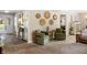 Open living space featuring neutral colors, comfortable furniture, and decorative wall accents at 3904 Haverhill Dr, Indianapolis, IN 46240
