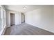 Bedroom with plush gray carpet and a closet for storage at 4055 Steelewater Way, Indianapolis, IN 46235