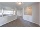 Hallway with gray carpet, white walls, and natural light from the windows at 4055 Steelewater Way, Indianapolis, IN 46235