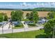 An aerial view of several single-Gathering homes boasts mature trees and picturesque country views at 410 W Douglas St, Martinsville, IN 46151