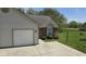 Well-maintained home with an attached garage, neat landscaping, and a welcoming front entrance at 413 Woodberry Dr, Danville, IN 46122