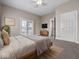 Spacious bedroom with natural light, neutral colors, and access to a balcony at 429 Colescott St, Shelbyville, IN 46176