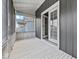 Cozy screened-in porch offering a relaxing outdoor space with fresh air and natural light at 429 Colescott St, Shelbyville, IN 46176