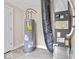 Utility room featuring a hot water heater and furnace for climate control at 429 Colescott St, Shelbyville, IN 46176