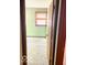 Bedroom view from the hallway with plush carpet and a window with blinds at 4419 Liberty Loop Rd, Martinsville, IN 46151