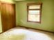 Bedroom featuring carpeted floors, a closet and a window with blinds at 4419 Liberty Loop Rd, Martinsville, IN 46151