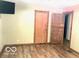 Bedroom featuring hardwood floors, two closets and a window at 4419 Liberty Loop Rd, Martinsville, IN 46151