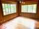 Inviting dining area with wood floors, large windows and great natural light at 4419 Liberty Loop Rd, Martinsville, IN 46151