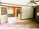 Cozy living room featuring hardwood floors, and a ceiling fan, open to the kitchen at 4419 Liberty Loop Rd, Martinsville, IN 46151