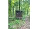 Exterior shot of a small shed in a wooded area at 4419 Liberty Loop Rd, Martinsville, IN 46151