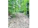 Leaf-covered trail through a wooded area at 4419 Liberty Loop Rd, Martinsville, IN 46151