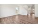 Spacious living room with hardwood floors, white walls, and natural light at 4785 E Shadowbrook Dr, Camby, IN 46113
