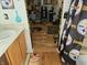 A glimpse into a Steelers-themed game room from the bathroom, showing playful and spirited decor at 4962 Potomac Square Pl, Indianapolis, IN 46268