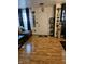 Inviting living room featuring stylish decor, warm hardwood floors, and ample natural light at 4962 Potomac Square Pl, Indianapolis, IN 46268