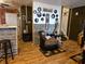 Open concept living room featuring a comfortable seating area, unique decor, and open access to the kitchen at 4962 Potomac Square Pl, Indianapolis, IN 46268