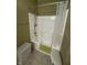 Bathroom featuring a shower and bathtub with a seat at 5486 Lipizzan Ln, Plainfield, IN 46168