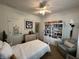 Bedroom with white bed and a bookshelf, providing a comfortable space at 5486 Lipizzan Ln, Plainfield, IN 46168