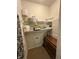 Well-organized closet with shelving for storage and a hanging shoe organizer at 5486 Lipizzan Ln, Plainfield, IN 46168
